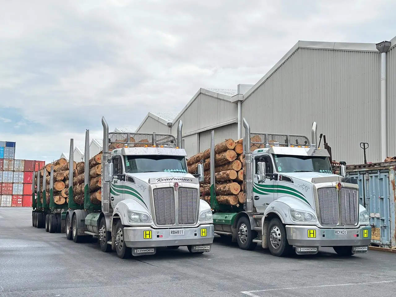 Two BHL trucks parked at a depot yard